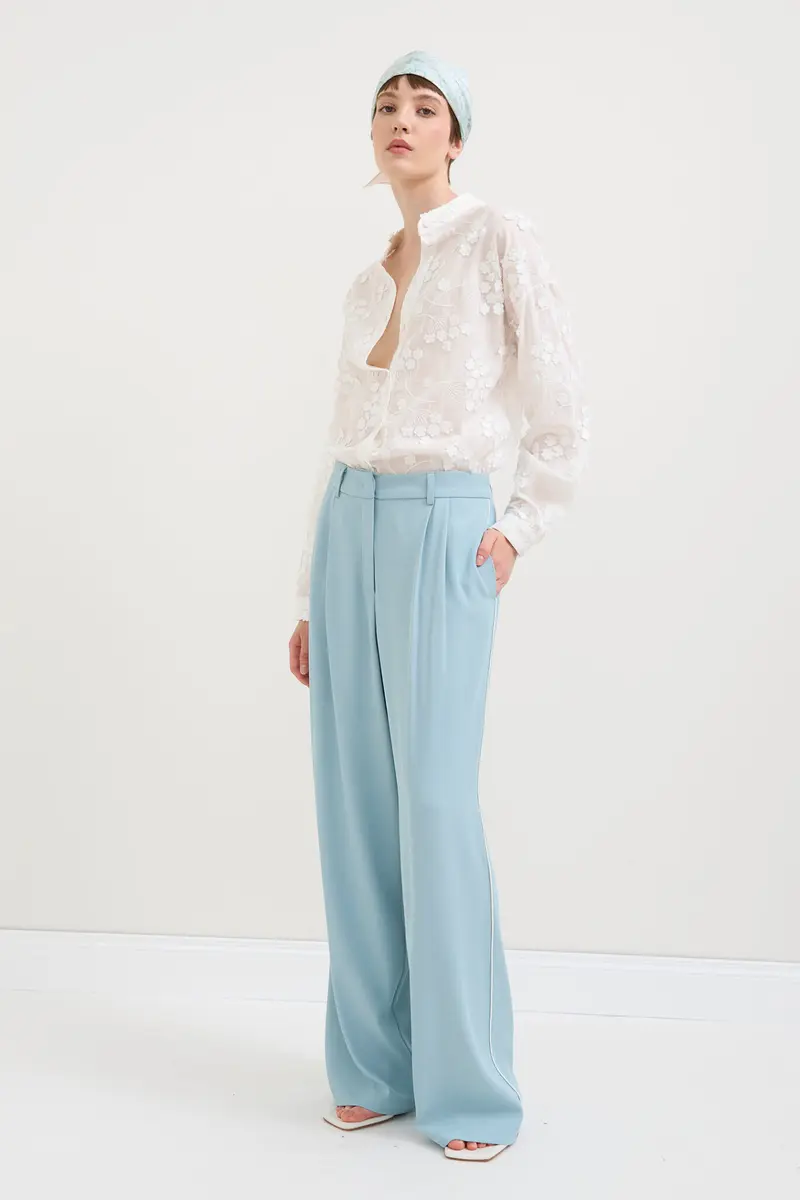 PANTALONI AMPI CON PIPING