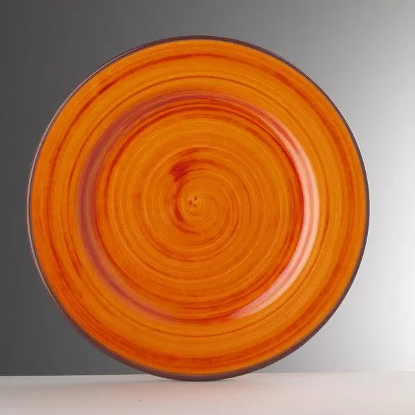 Piatti Saint Tropez in melamina arancio di Mario Luca Giusti