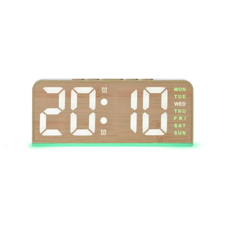 Sveglia digitale con retroilluminazione ambientale, visualizzazione di ora, giorno della settimana, data e temperatura.